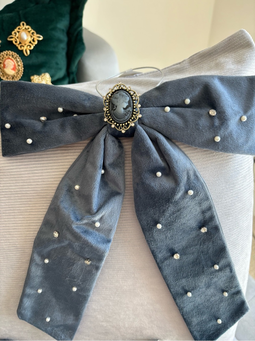 Gray Velvet Bow Decor with Cameo Accent